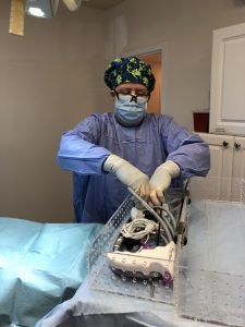 One of our doctors getting ready for a procedure
